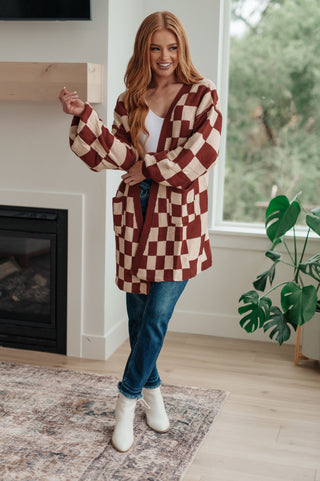 Effortless Layering in Style: Women's Checkered Cardigan. This versatile checkered cardigan adds a touch of pattern and warmth to any outfit. 